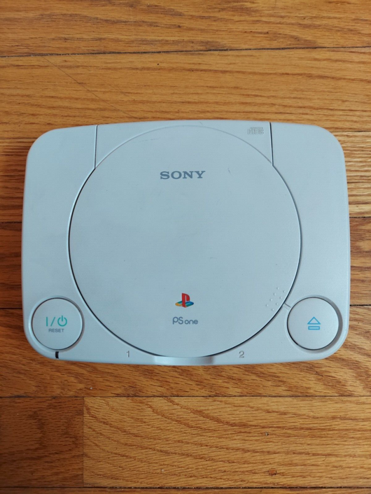 Sony PS One Slim (SCPH-101) Bundle W/1 Controller, Cords, & 2 Games (WCW Nitro,