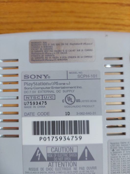 Sony PS One Slim (SCPH-101) Bundle W/1 Controller, Cords, & 2 Games (WCW Nitro,