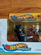 Hotwheels Racer Verse: Batman (4 Pack) - Batman Harley Quinn, Robin, Catwoman
