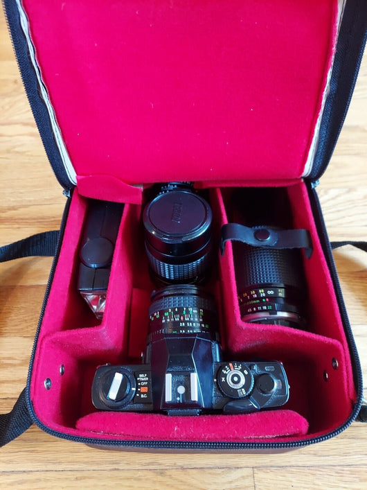 Minolta X-7 Camera W/Focal 1:2.8 28mm Lens, Minolta 1:1.7 50mm Lens, W/ Bag