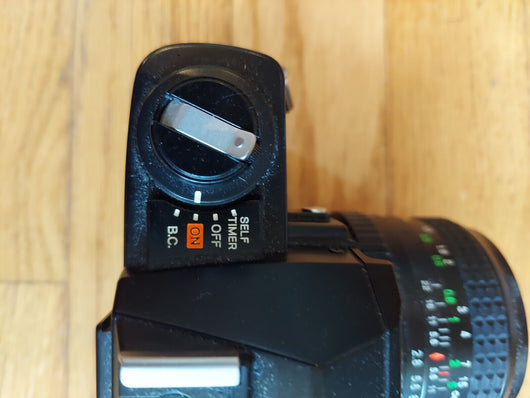 Minolta X-7 Camera W/Focal 1:2.8 28mm Lens, Minolta 1:1.7 50mm Lens, W/ Bag