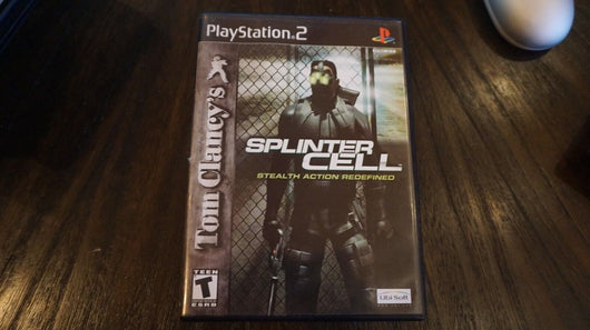 Tom Clancy's Splinter Cell for Playstation 2. No manual, Works. Awesome game