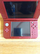 New Nintendo 3DS XL (Maroon) Bundle W/Stylus, Charger, Carrying Bag, & 5 Games