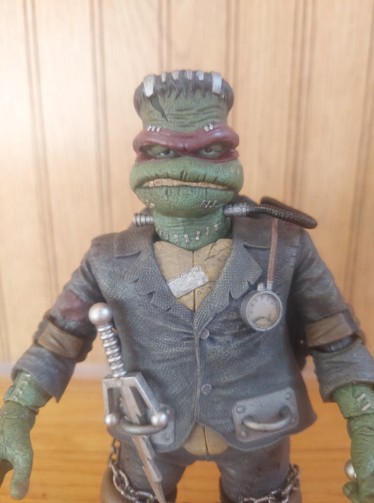 NECA (2021) Teenage Mutant Ninja Turtles/Universal Monsters Raphael Frankenstein