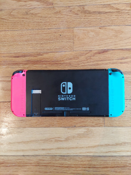 Nintendo Switch W/Docking Station, Joy Con Comfort Grip, & Cord, Works,Fast Ship