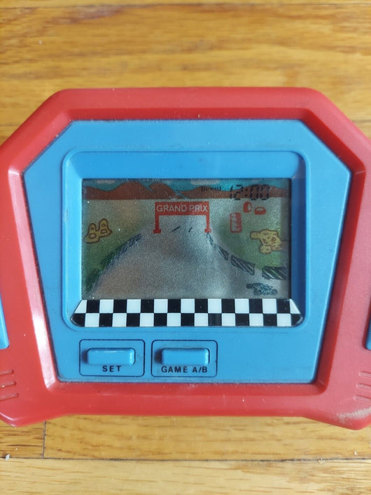 Vintage LCD display Xenon Car Racing Video game Handheld ,Works, No Batt Cover