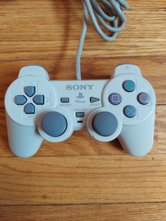 Sony PS One Slim (SCPH-101) Bundle W/1 Controller, Cords, & 2 Games (WCW Nitro,