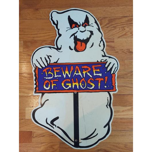 Ghost-themed decorative sign with 'Beware of Ghost!' text on a wooden floor.